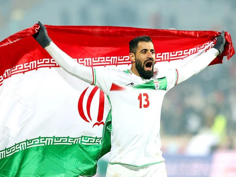 Iran national football team players during a match as sports minister says Iran cannot participate in the FIFA World Cup